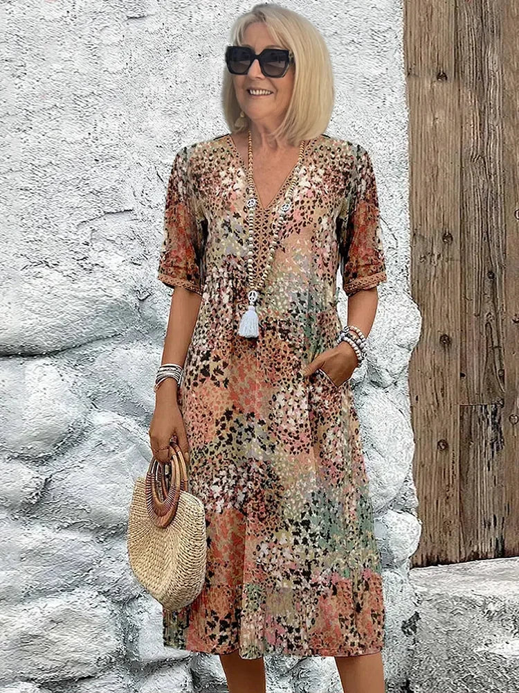 Lina™ | Lekka sukienka z dekoltem w szpic