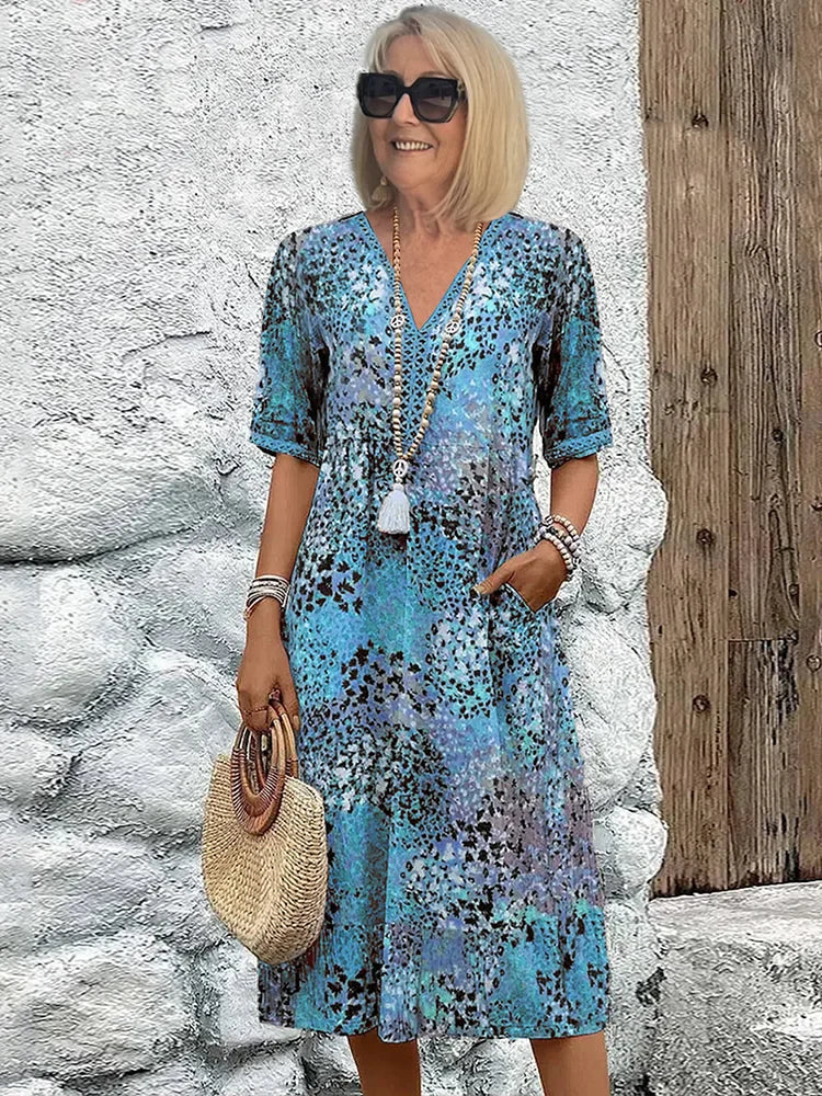 Lina™ | Lekka sukienka z dekoltem w szpic