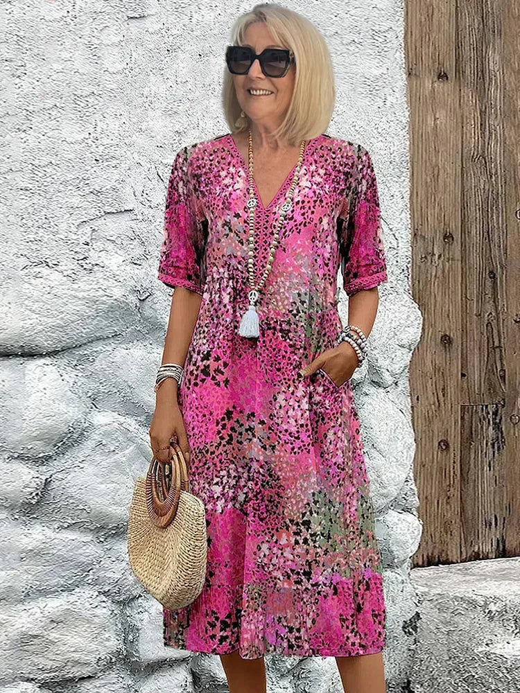 Lina™ | Lekka sukienka z dekoltem w szpic